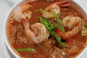 Sour curry with vegetable omelet with shrimp