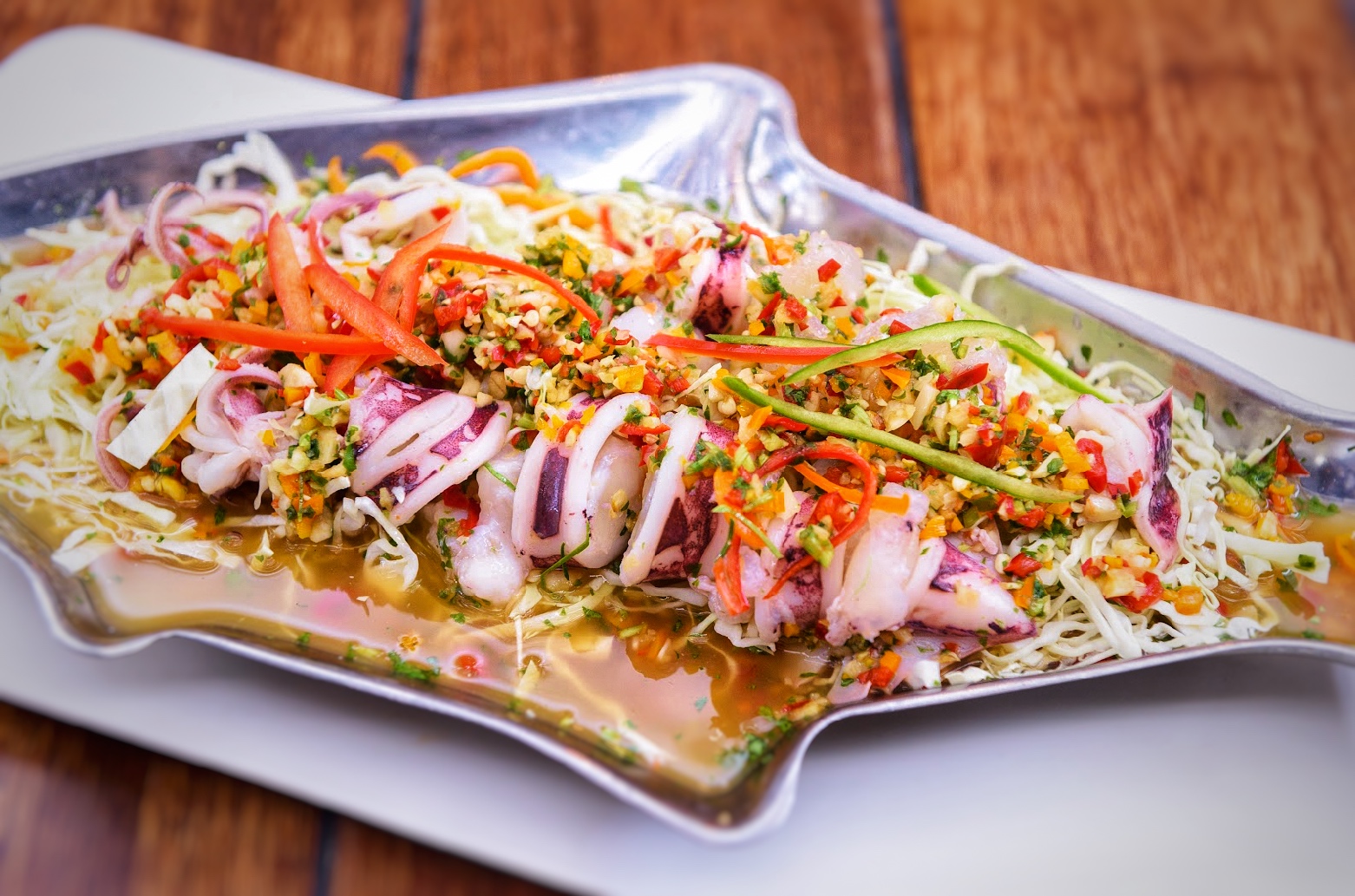 ปลาหมึกนึ่งมะนาว ( Spicy Sour Soup with Squid )